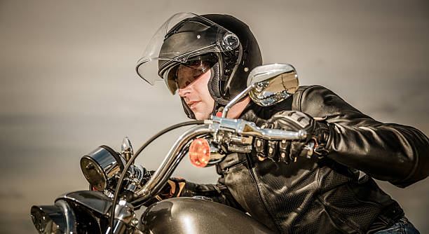 istock Biker racing on the road 475099416
