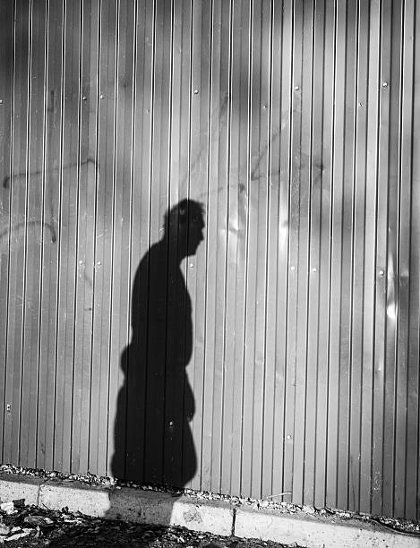 istock Shadow of People Walking 475099518