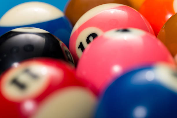 istock Close-Up Of Pool Balls On Blue Table 475100829