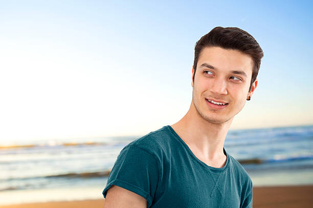 istock Portrait of smiling young man 475100842