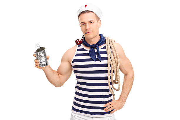 istock Young sailor smoking tobacco and holding an empty can 475104234