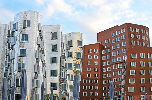 istock DUSSELDORF, GERMANY - APRIL 16: Modern buildings in Media harbor 475105452
