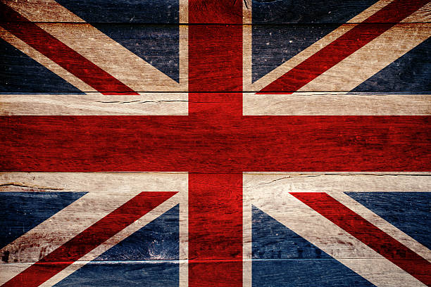 British flag painted on grungy wooden background.