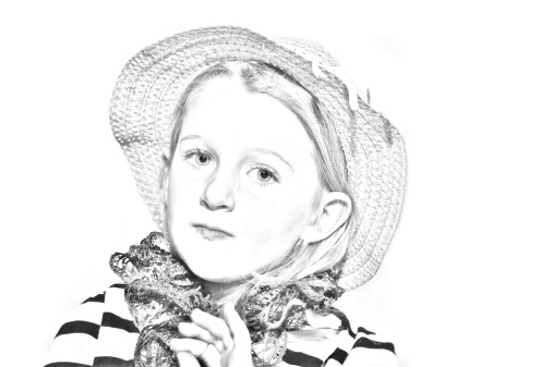 Black and white image of a girl in a hat.