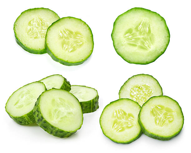 Cucumber Cucumber isolated on white background cucumber slice stock pictures, royalty-free photos & images