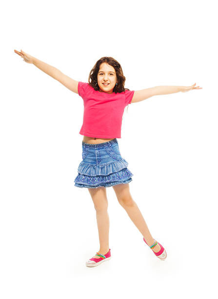istock Happy jumping 11 years girl 475111057
