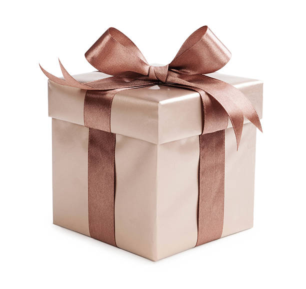 istock Gold box with gifts and brown bow 475112172