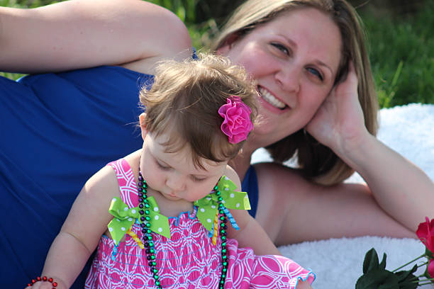 istock Mother and Daughter Pose For Camera 475112586