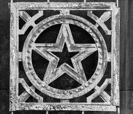 Aged soviet Russian Star in cast iron with flakes and signs of age