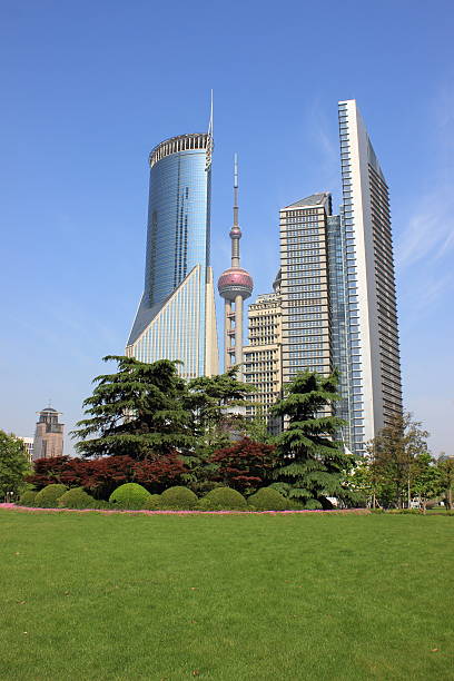 istock Grass and buildings in Shanghai, China 475119566
