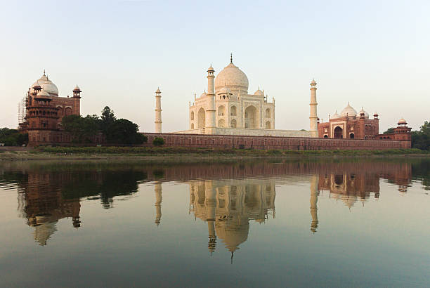istock Taj Mahal sunrise with reflections 475124224