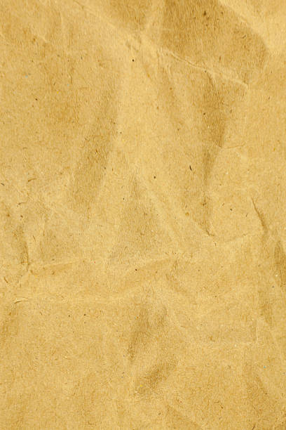 istock Yellow paper crumpled texture background. 475125720