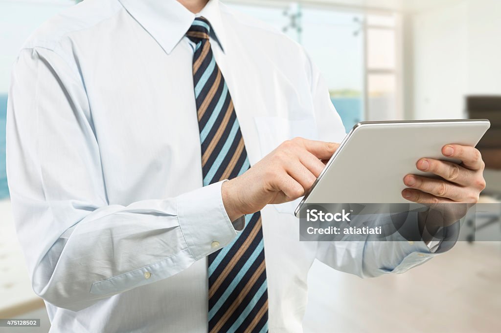Geschäftsmann mit digitalen tablet - Lizenzfrei 2015 Stock-Foto