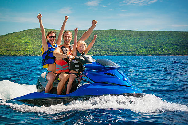 istock Family Riding a Jet Boat 475128816