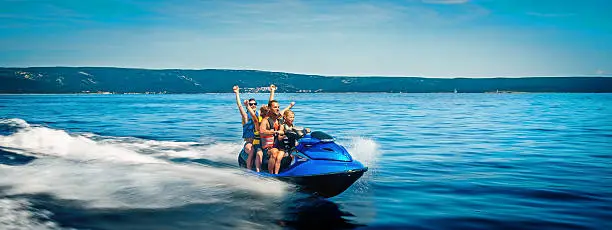 Photo of Family Riding a Jet Boat