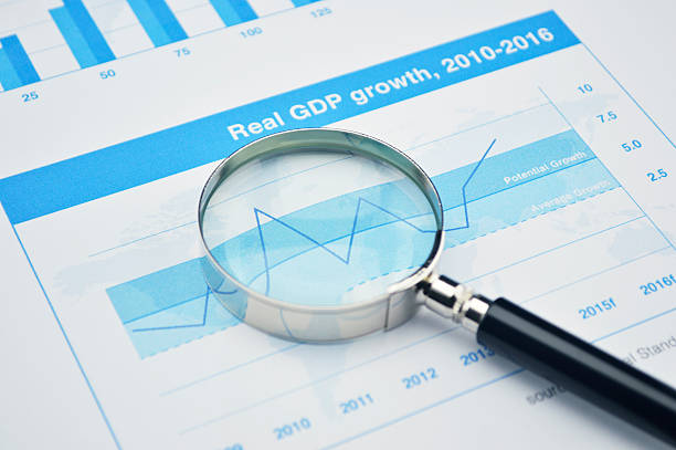 istock Magnifying glass on financial graph, accounting background 475130170