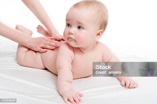 Mother Massaging Her Lovely Baby Stock Photo - Download Image Now - Baby - Human Age, Massaging, Massage Therapist