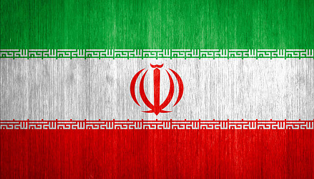 istock Iran Flag on wood background 475132847