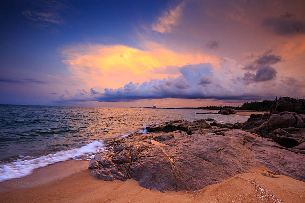istock sunrise at Ho Coc Beach with weird colorful sky 475133188
