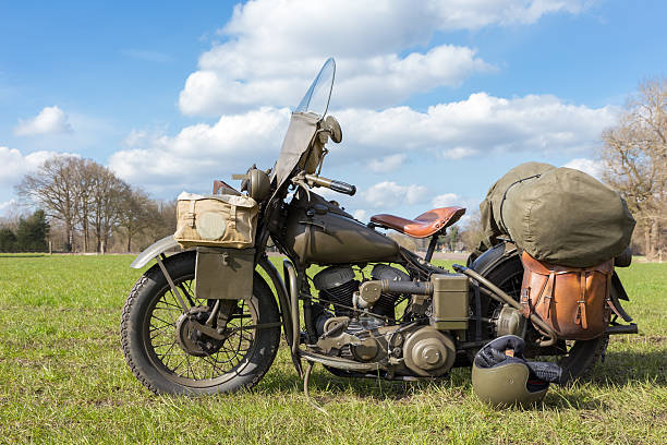 istock Old military motorcycle in landscape 475133846