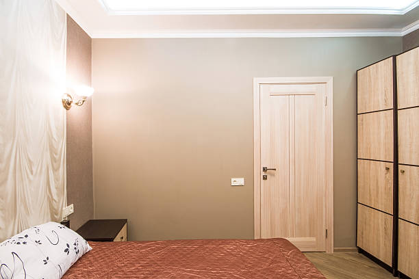 istock Hotel room. Small bedroom with double bed 475136382