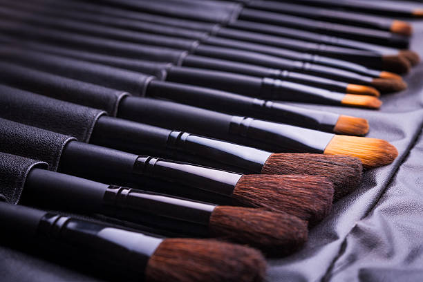 istock Set of black make-up brushes in row 475139335