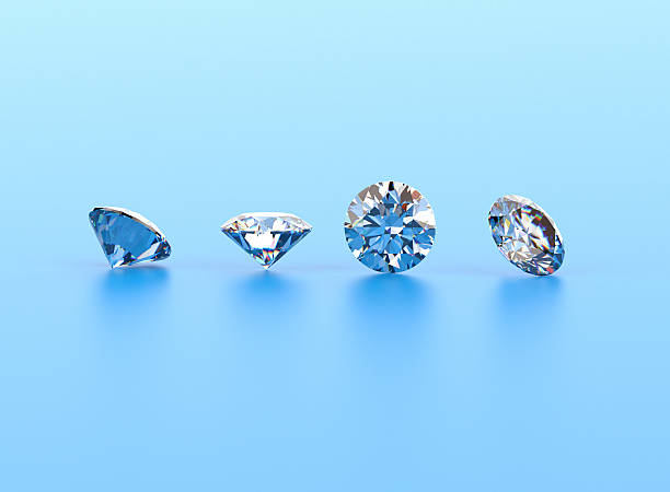 istock Diamond jewel isolated  on a light blue  reflective surface 475143012