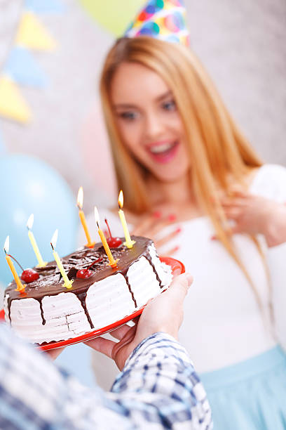 istock Happy girl and her birthday cake 475144252