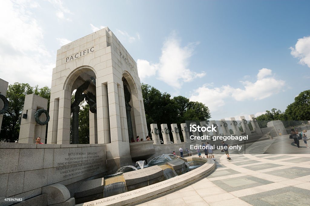 National World War II Memorial in Washington, DC Washington, United States - August 17, 2014: People meander about the National World War II Memorial during the daytime. The National World War II Memorial opened on April 29, 2004 and has more than 4.4 million annual visitors.  2015 Stock Photo