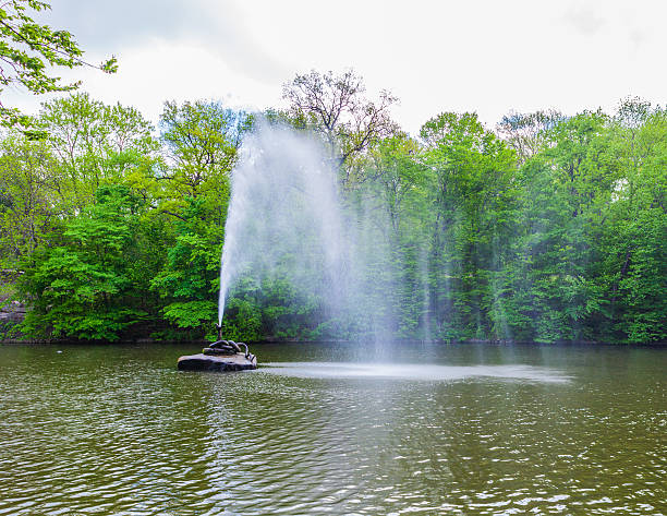 istock landscape lake with fountain 475148428