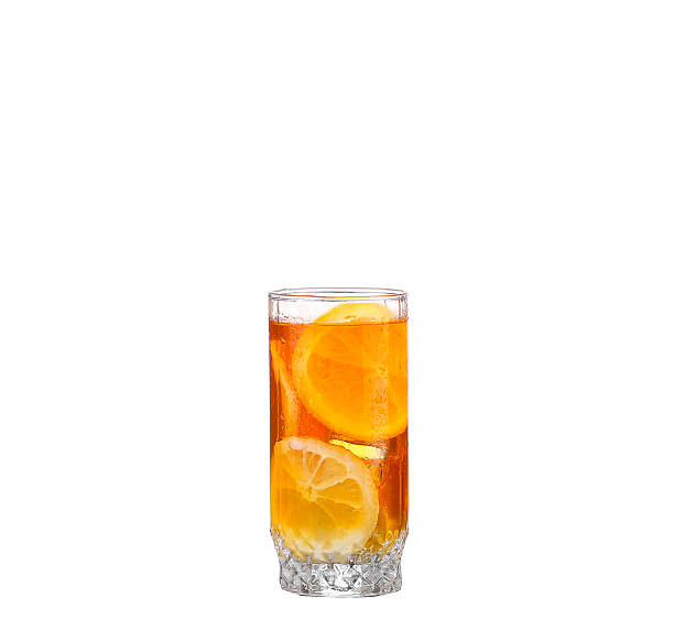 istock Amber cocktail in a glass isolated on a white background 475148806