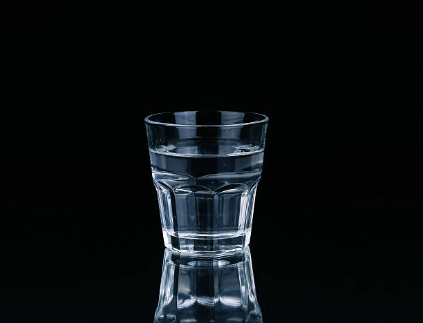 istock water on a glass on dark background. 475149254