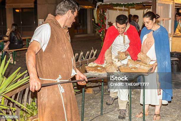 Roman Baking Bread In The Street Market Stock Photo - Download Image Now - 2015, Ancient Rome, Baking
