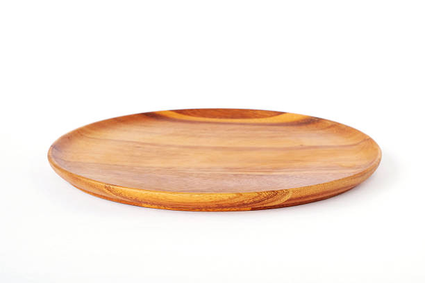 istock Empty round wooden plate isolated on white background 475150826
