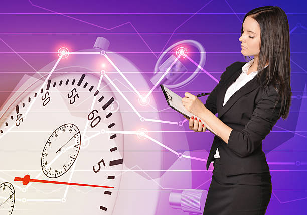 istock Young girl in office clothes writes data to the clipboard 475154568