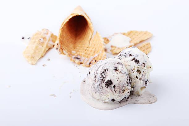 istock homemade cookie and cream ice cream scoop drop melt 475154662