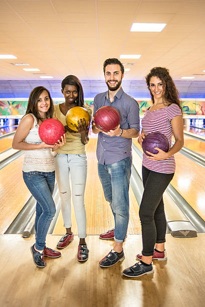 istock Group of friends at the bowling 475154852