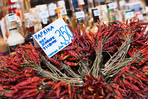 Locally grown paprika for sale in dried bunches at the Central Market Hall, Budapest, Hungary
