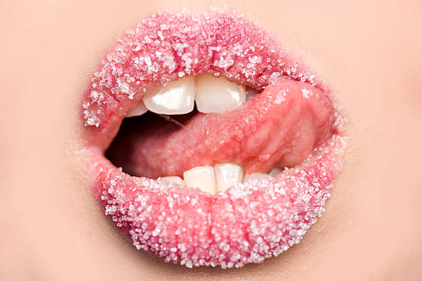istock Lips with sugar and tongue 475156236