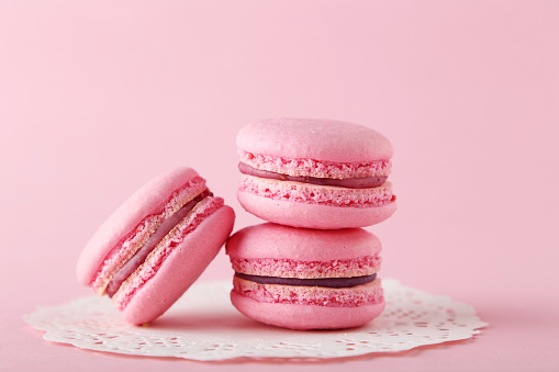 French pink macarons on pink background