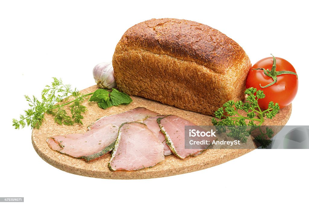Ripe fresh ham with vegetables Ripe fresh ham with vegetables and bread Baked Stock Photo