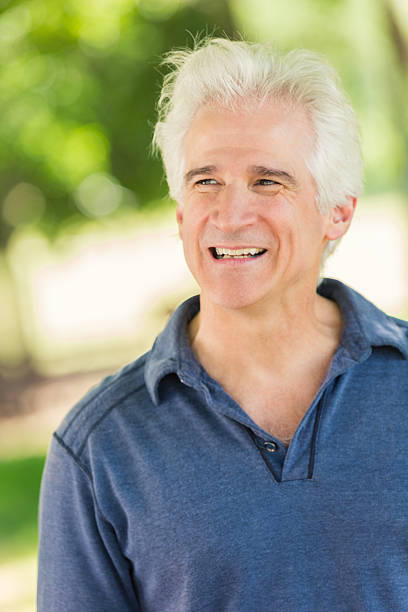 istock Senior Caucasian gray haired man outdoors on sunny day 475159526