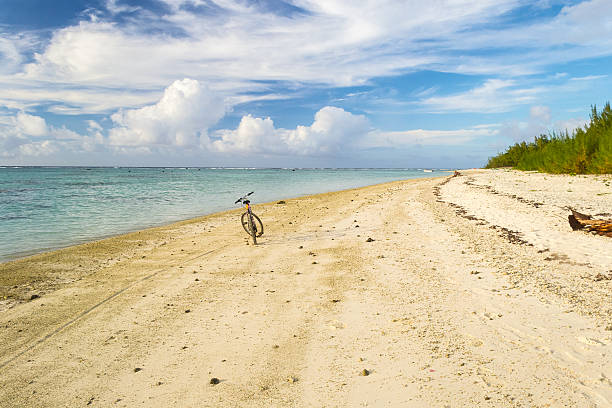 istock Lone push bicycle on a tropical desert beach 475160116