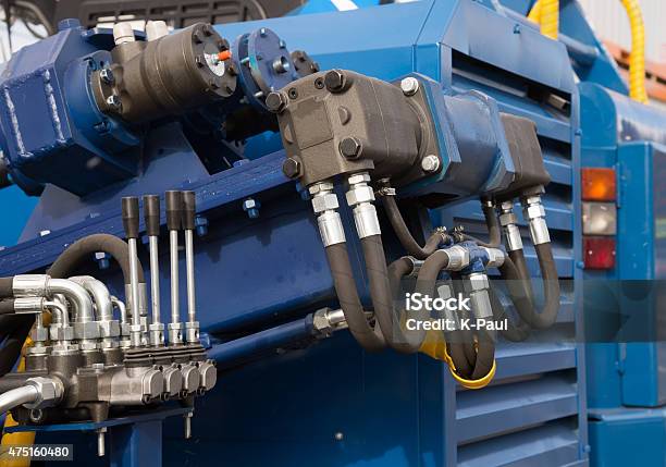 Hydraulic Tubes Fittings And Levers On Control Panel Stock Photo - Download Image Now