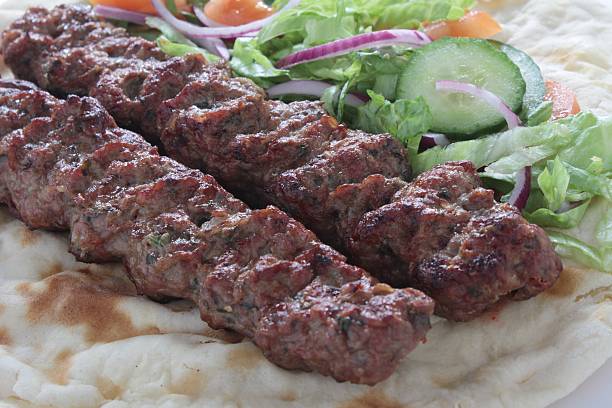 istock lamb kofte shish kofta kebab naan sandwich 475160509