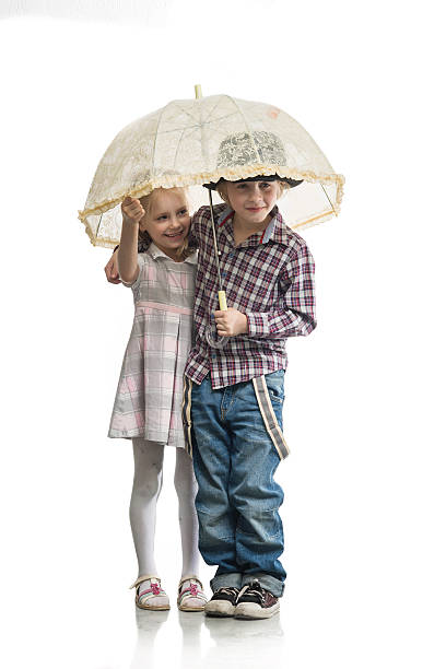 istock Children under the umbrella 475162086