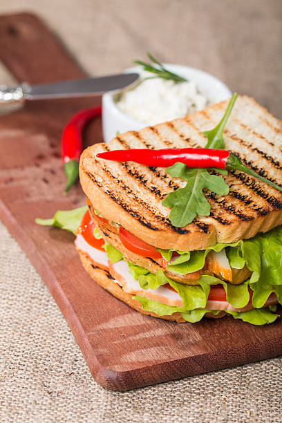 istock Classic club sandwich with bacon and vegetables 475163036