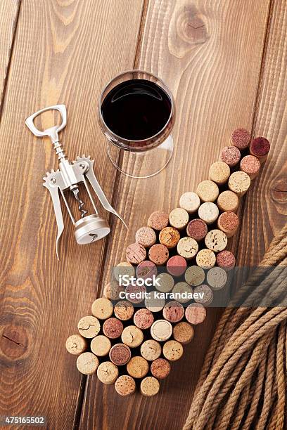 Wine Bottle Shaped Corks Glass Of Red Wine And Corkscrew Stock Photo - Download Image Now
