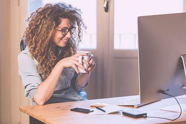 istock Young woman working at home or in a small office 475171984