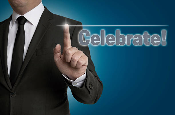istock Celebrate touchscreen is operated by businessman 475173126